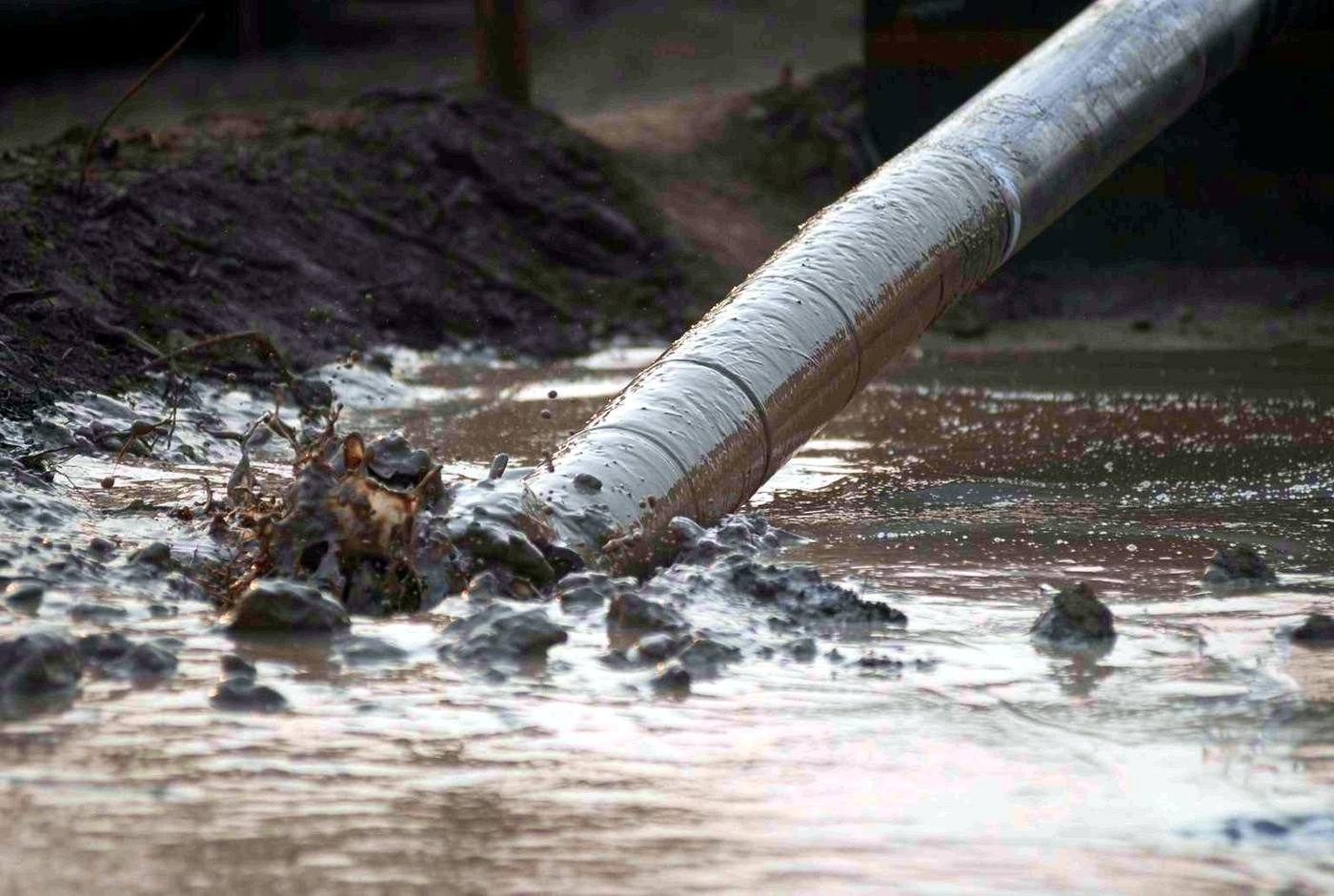 Steel pipeline emerging from a drilled crossing